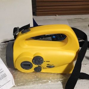 Suntone Model:RR880 AM/FM Flashlight radio with LCD clock and shoulder strap